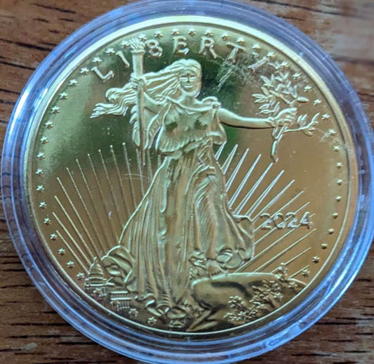 2024 American Liberty Eagle Tribute Round gold-tone metal coin with Saint-Gaudens Liberty design in protective capsule