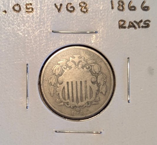 1866 Shield Nickel first year issue with rays design showing Union shield and stars