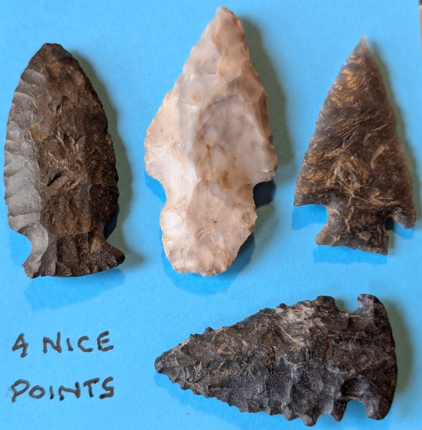 Set of 4 authentic Native American projectile points made of mixed flint and chert, with detailed notching and distinct flaking from the Ohio/Midwest region