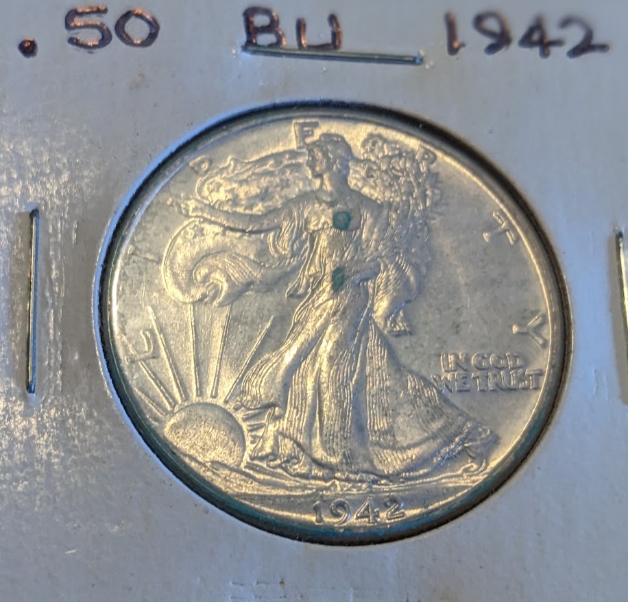 1942 Walking Liberty Half Dollar coin featuring Lady Liberty walking with sunrise design