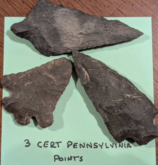 Three authentic Pennsylvania chert projectile points with visible percussion flaking and natural wear