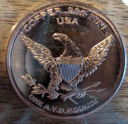 1886 Seated Liberty Dollar copper replica coin marked COPY with heraldic eagle reverse and reeded edge