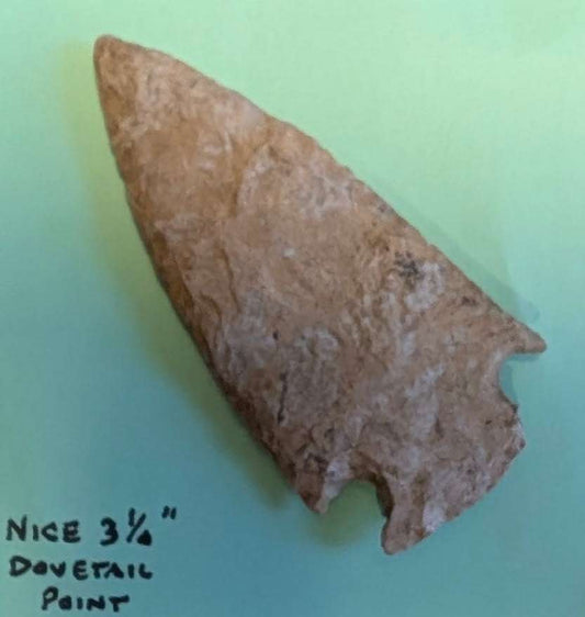 Large dovetail Native American projectile point made of chert with bifacial flaking from Early Archaic period