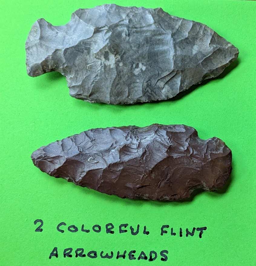 Pair of colorful flint blade arrowheads made from multicolored chert with strong flaking and prehistoric craftsmanship