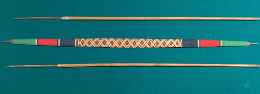 Handcrafted Indigenous style wooden bow with woven grip and two arrows in tribal design