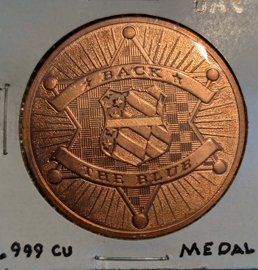 1 oz .999 fine copper "Back the Blue" round medal with USA eagle, flag, and sheriff badge design, proof-like finish