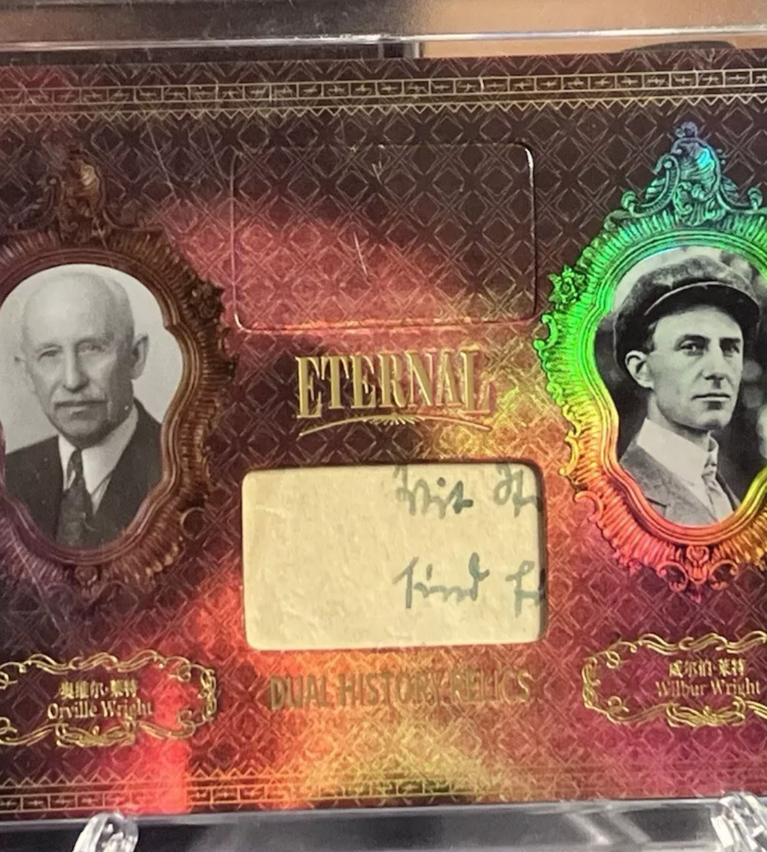 Orville Wright and Wilbur Wright dual manuscript relic card with visible handwritten fragment from early 20th-century aviation history