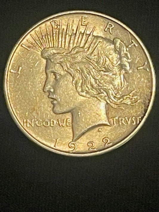1922 Peace Silver Dollar coin featuring Lady Liberty with radiant crown in fine condition