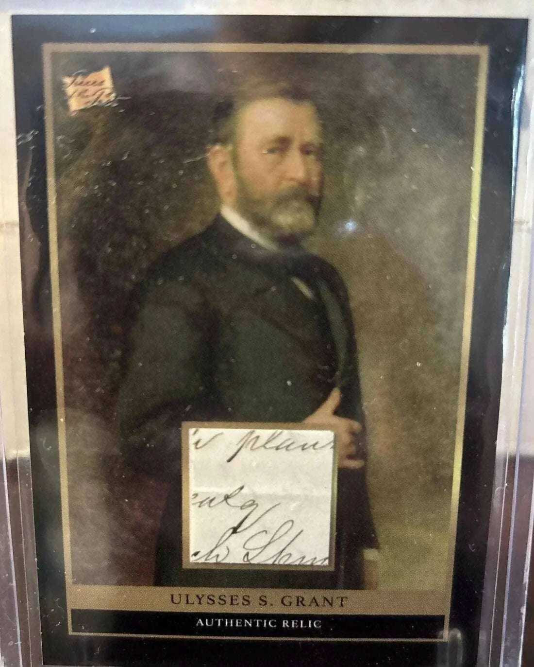 Ulysses S. Grant relic card with authentic handwritten fragment and presidential portrait in protective holder