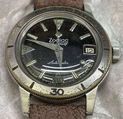 Vintage circa 1960s Zodiac Seawolf automatic watch with classic design.