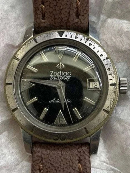 Vintage circa 1960s Zodiac Seawolf automatic wristwatch with rotating bezel and brown leather strap