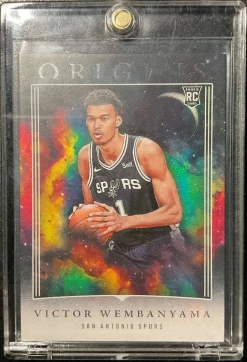 2023-24 Panini Origins Victor Wembanyama RC Rookie card, featuring dynamic design.