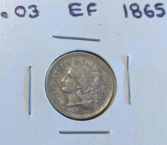 1865 Three-Cent Piece nickel coin in extra fine condition.